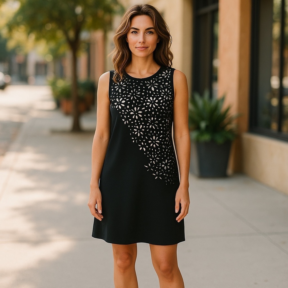 Calvin Klein black cut out dress with white lining. NWT.